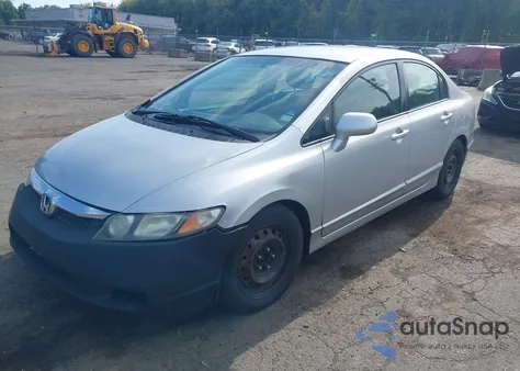 2010 Honda Civic Lx z USA, uszkodzony, nr VIN 2HGFA1F57AH329387
